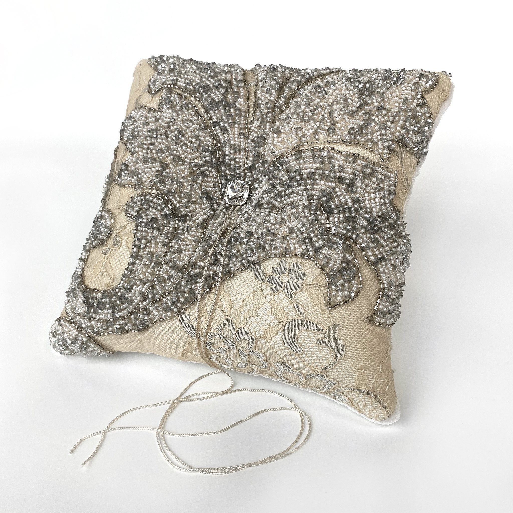 Silver on sale beaded pillow